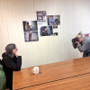 Joan Irons having her picture taken at the People First Offices