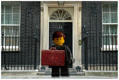Lego figure holding the red Budget briefcase