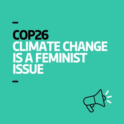 The graphic shows a bright teal background with black and white left-aligned text that reads "COP26 Climate Change is a Feminist Issue". In the bottom right-hand corner there is an icon of a megaphone.